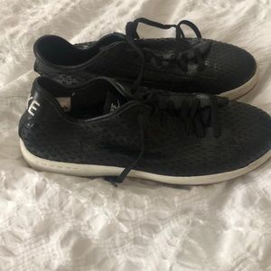 Black leather Nike sneakers
